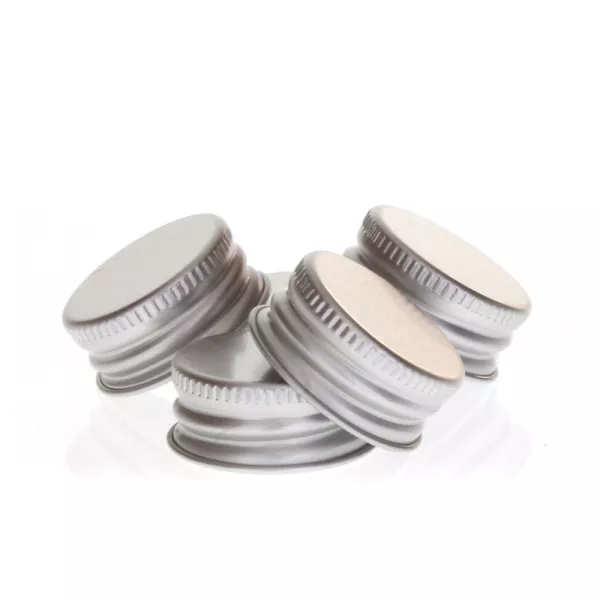 Bouchons alu pour flacons en verre